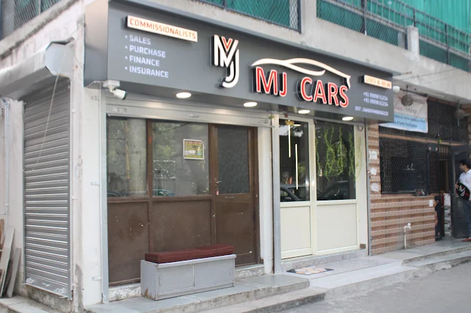 M J CARS